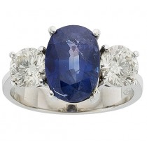 Platinum Oval Shaped Sapphire and Full Cut Round Diamond Ring 